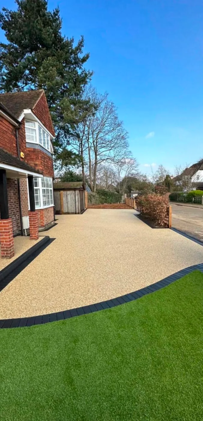 Resin bound driveway at a red brick house