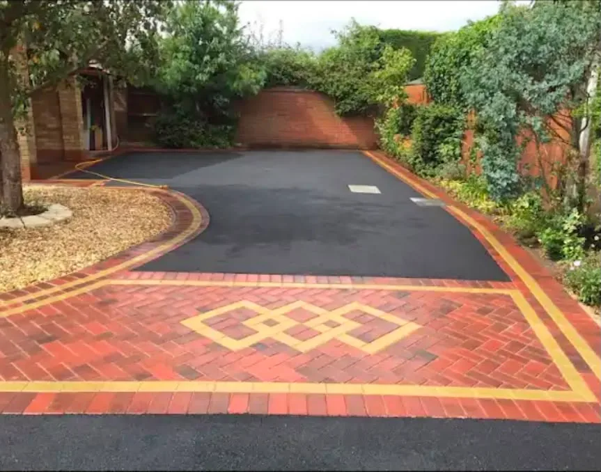 Tarmac driveway with a block paved border