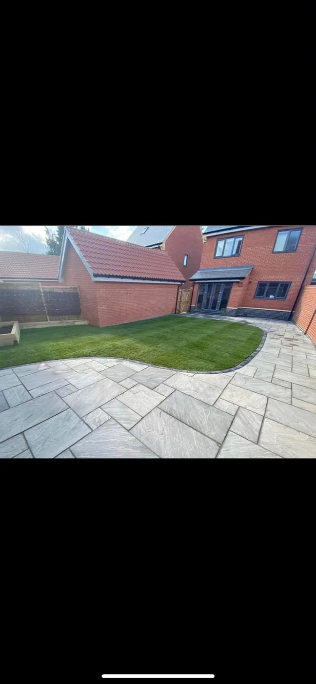 Sandstone patio and lawn